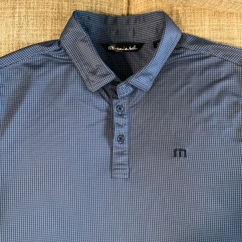 Travis Mathew athletic polo shirt sleeve shirt. Color blue. Size Medium.